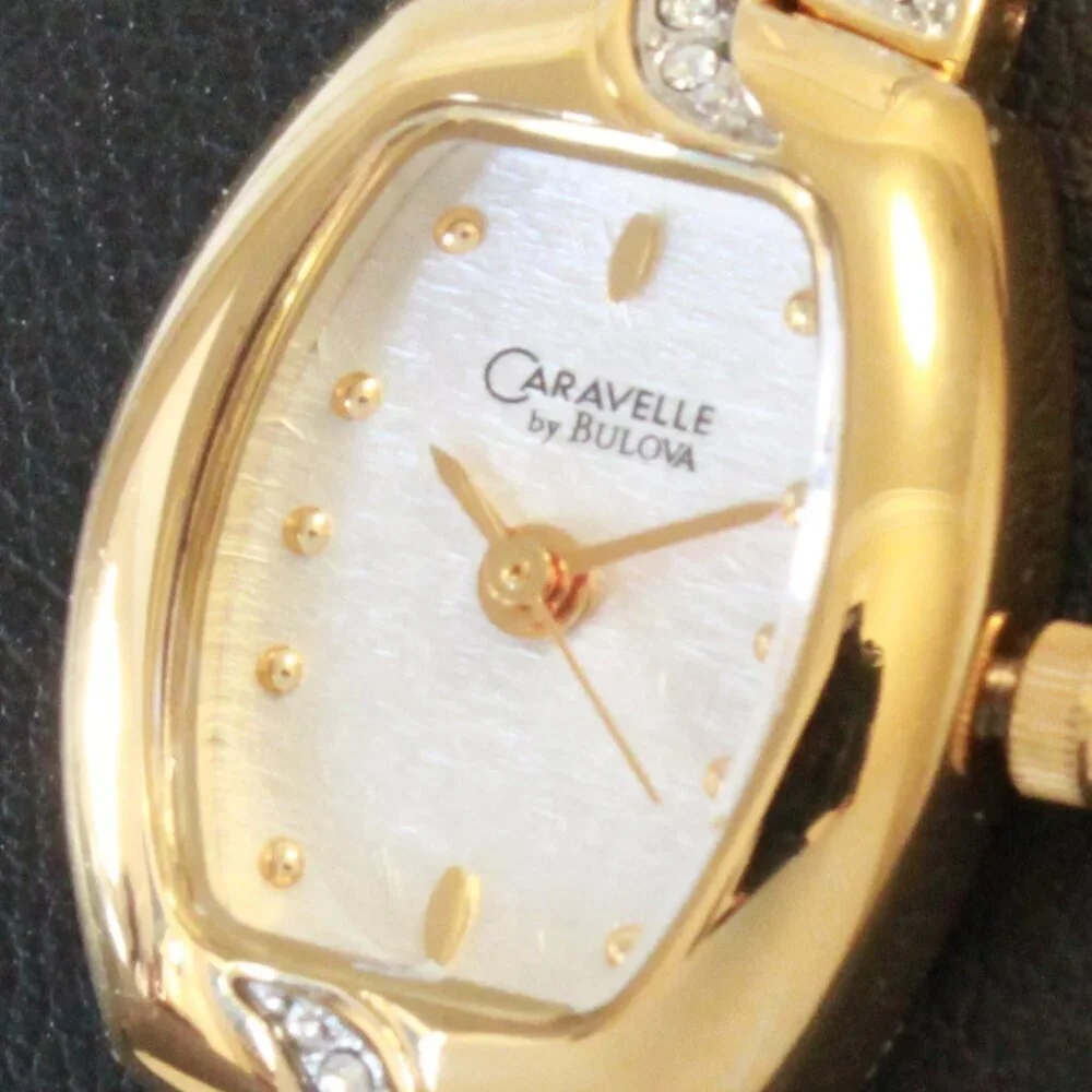 Caravelle Ladies Gold Tone Quartz Watch, MOP Dial, ½ Bangle Bracelet 16mm